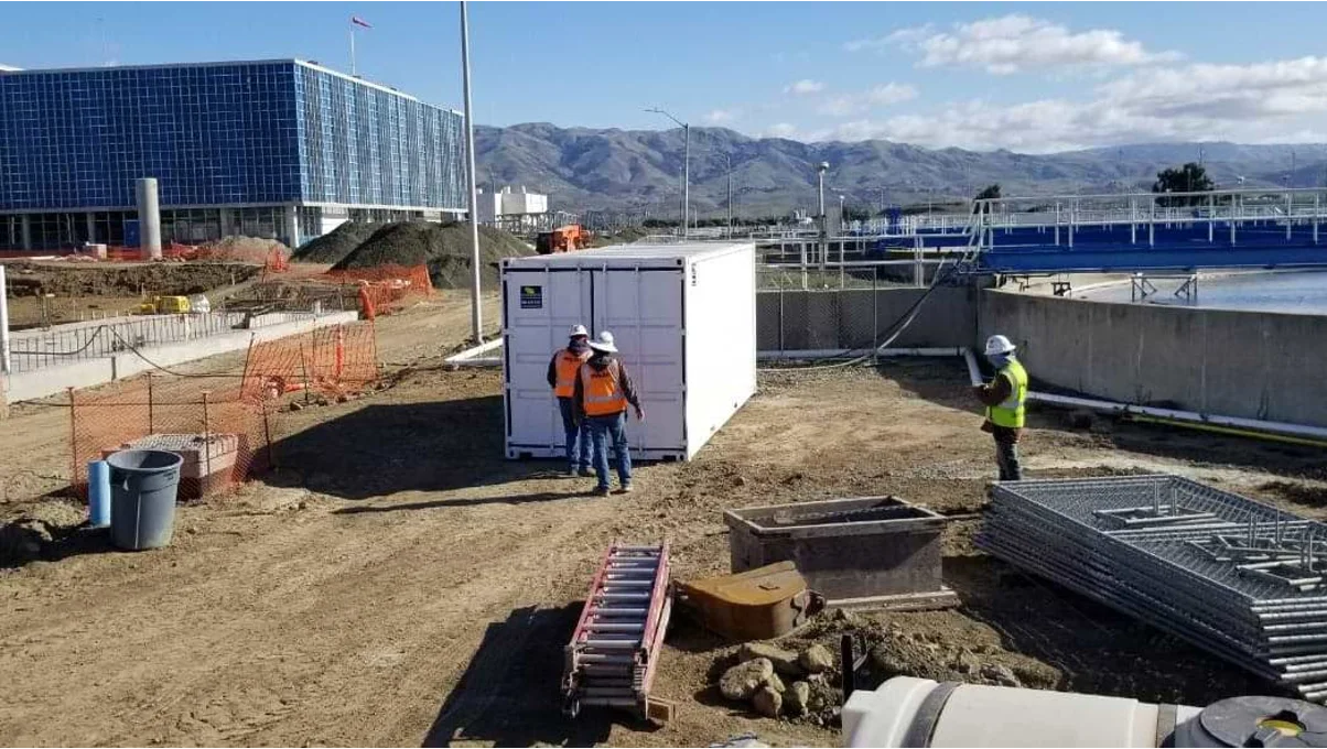 Conexwest team working on a container.
