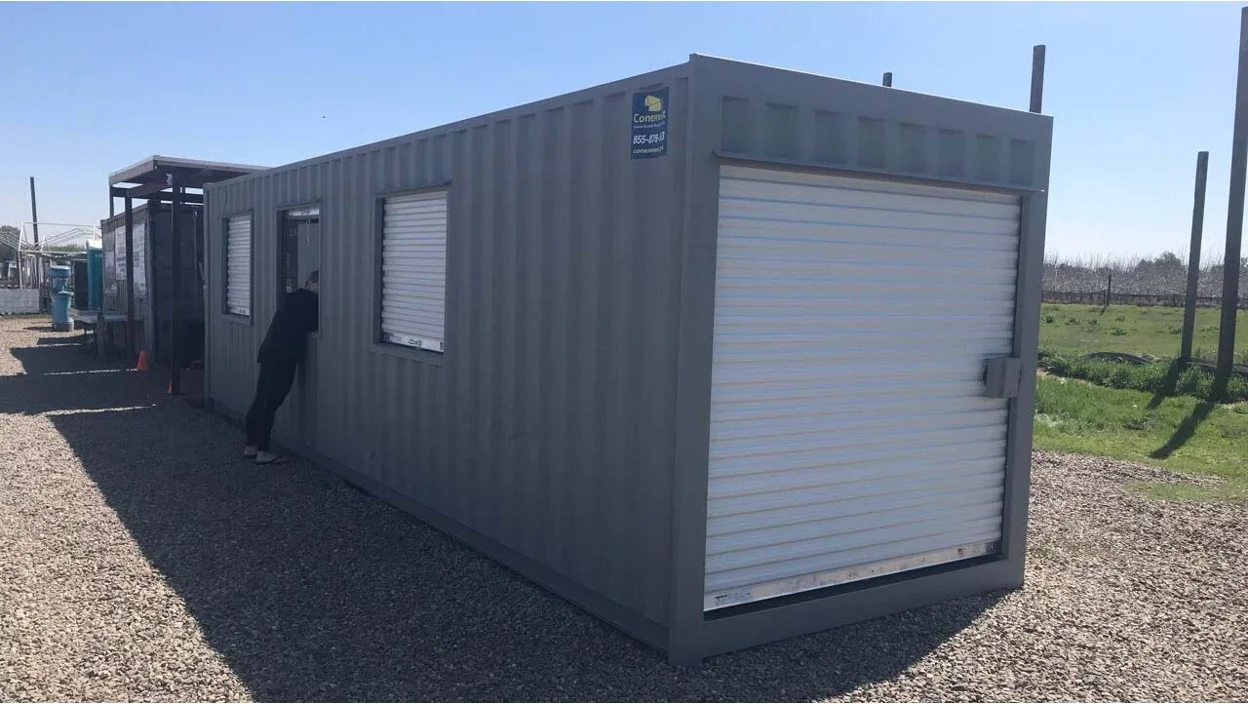 Container with a roll-up door.