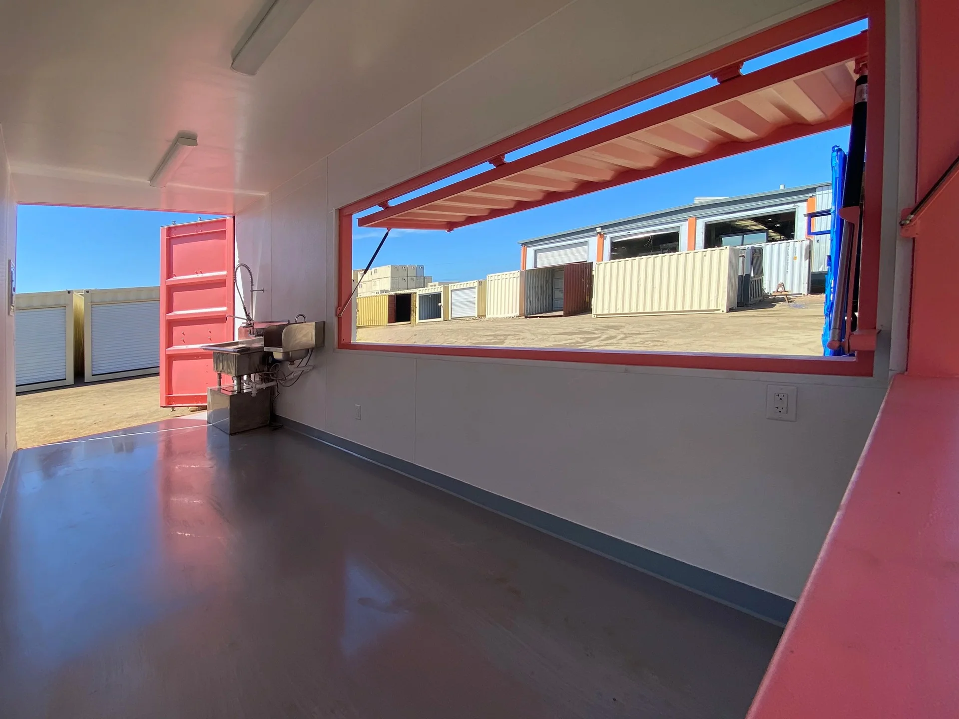 20ft container storefront interior with non-slip flooring and clean white panels
