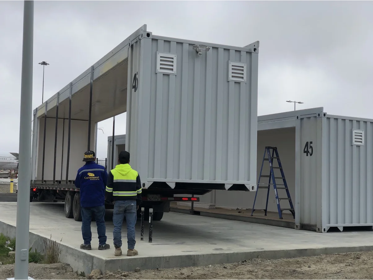 Conexwest team inspecting a container delivery
