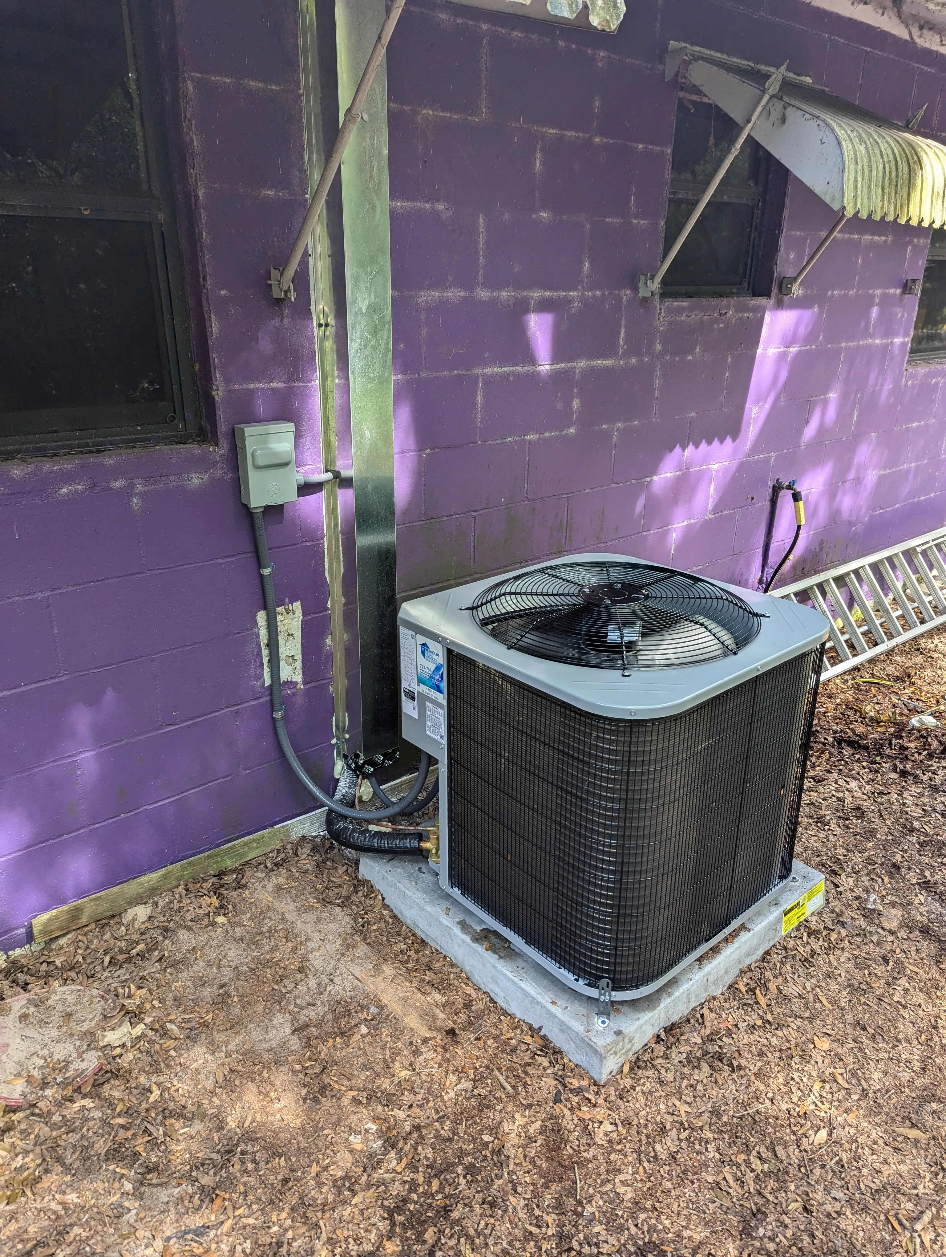 Residential outdoor AC unit installed for reliable home cooling services and maintenance