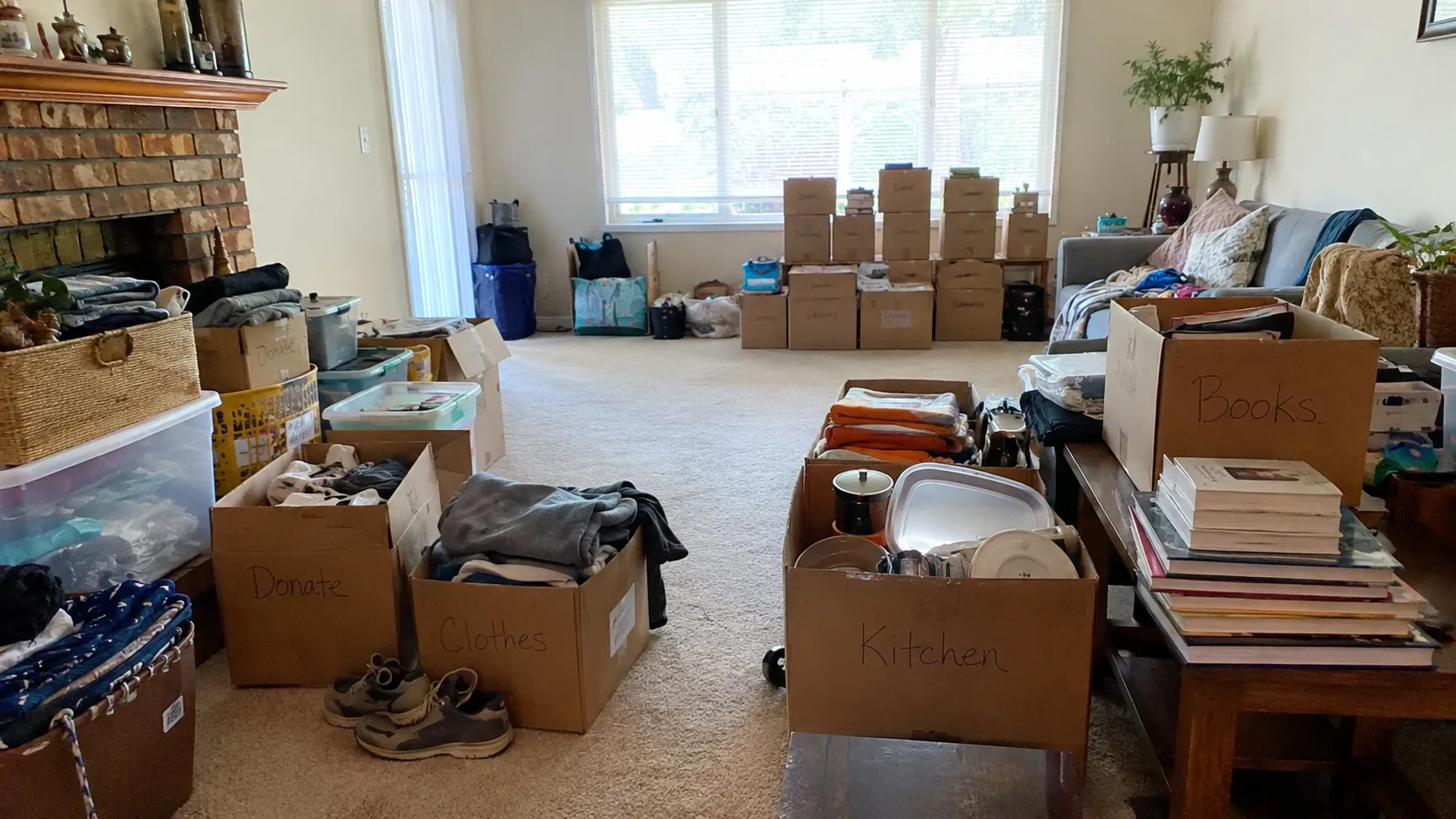 Household items sorted into keep donate and toss piles during an estate cleanout
