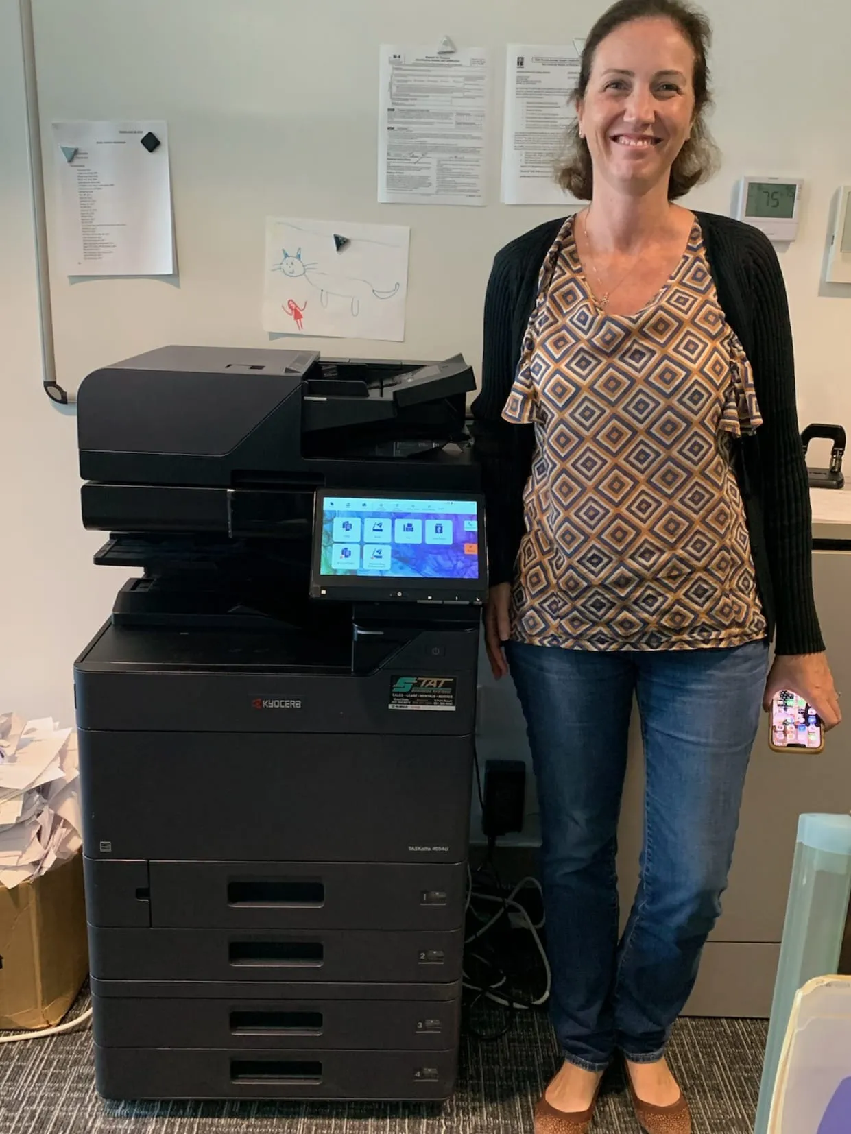 Advanced copier model in an office, representing benefits of leasing copiers