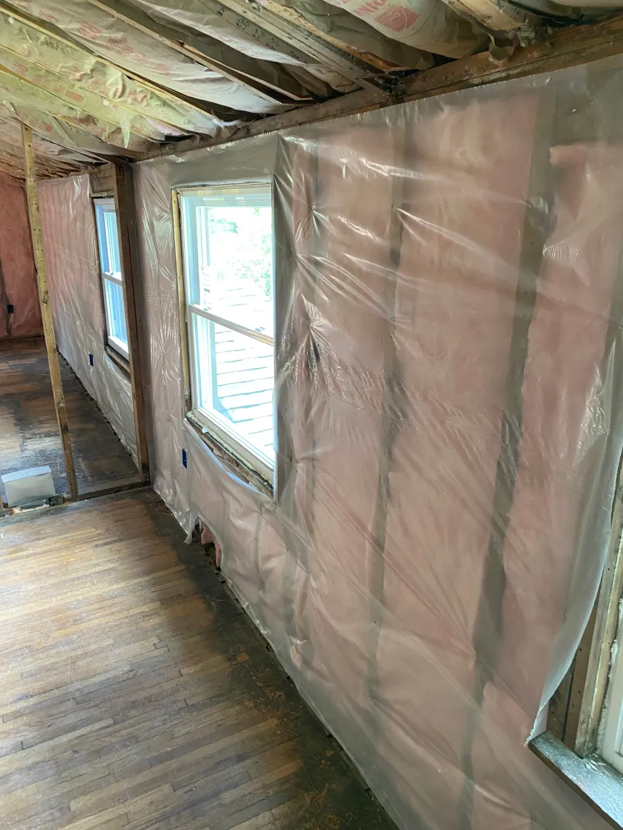 A visual representation of different insulation types, including fiberglass batts, spray foam, and blown-in insulation, demonstrating options for improving home energy efficiency.