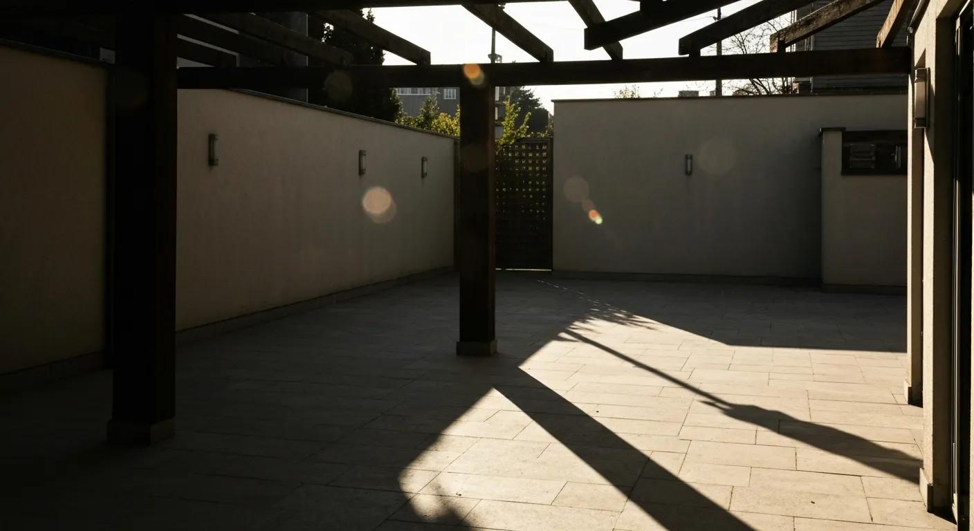 Outdoor space with poor lighting showing harsh shadows and glare affecting aesthetics