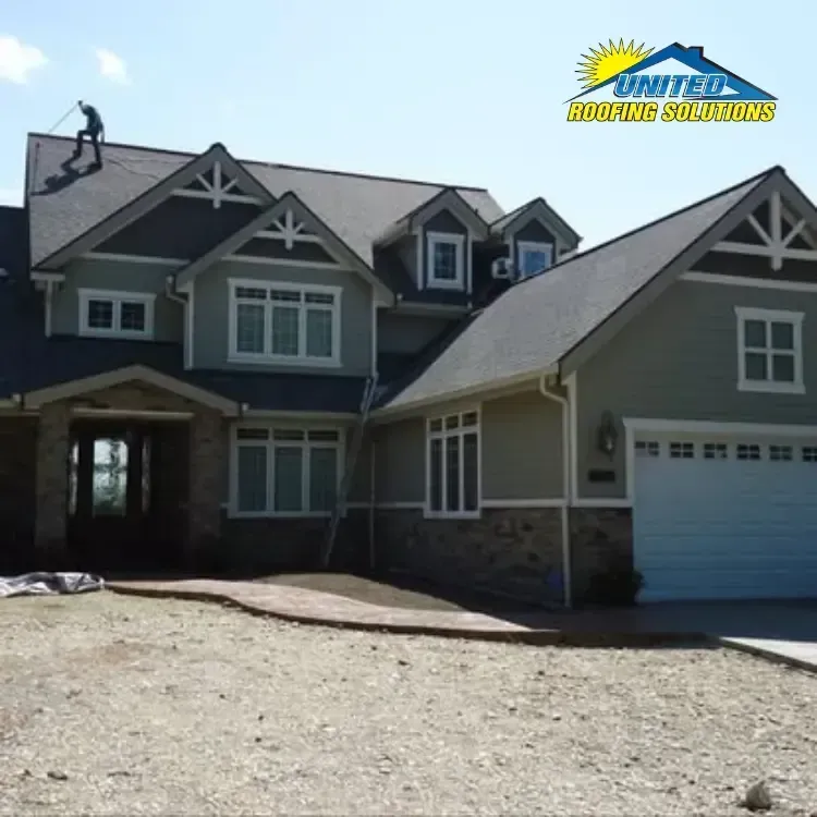 Homeowner and contractor reviewing a roof inspection report
