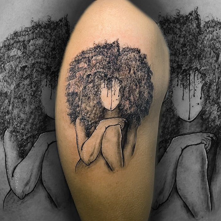 A unique black and grey tattoo of a faceless woman with voluminous, textured hair, utilizing delicate stippling and dripping ink effects for a cinematic look.
