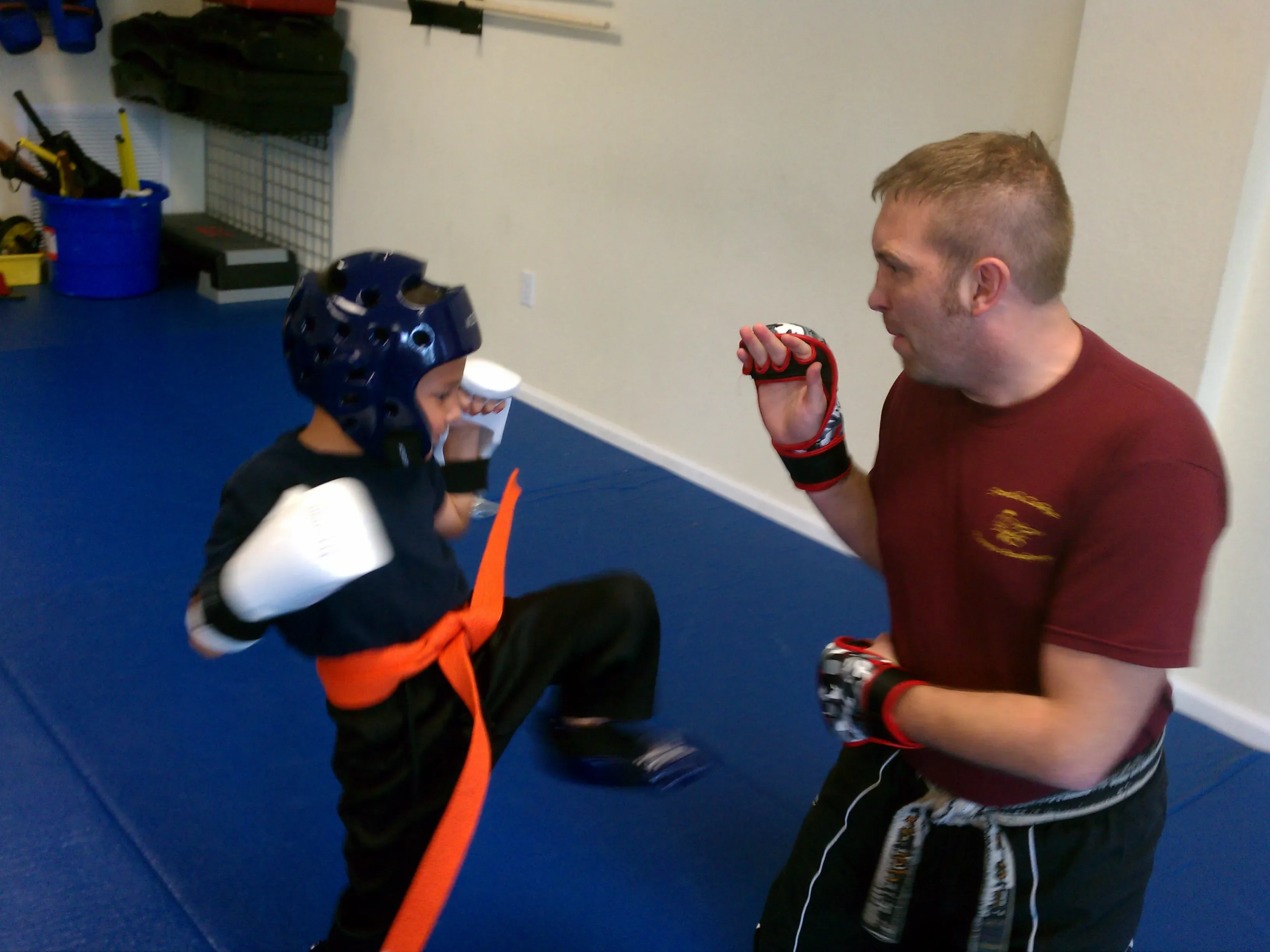 Young children learning karate techniques in a fun and supportive dojo environment
