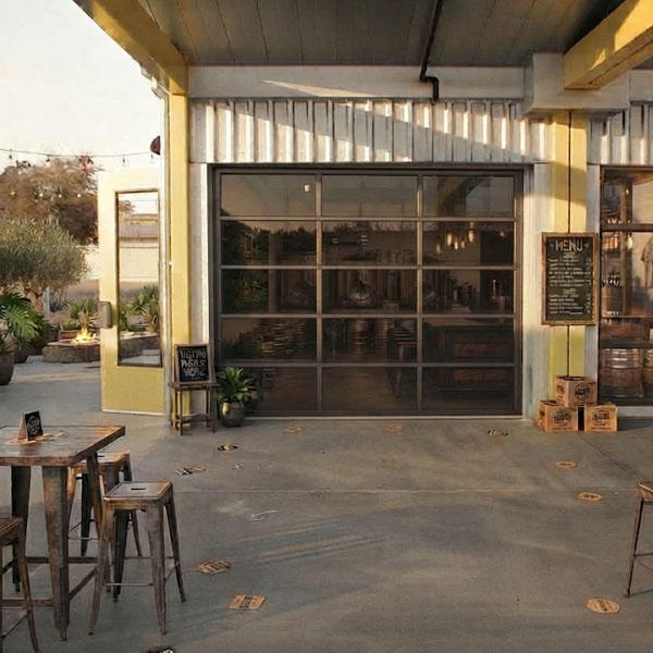 Adaptive Reuse and Glass Garage Doors: Replacing Legacy Overhead Openings in Warehouse and Service-Station Conversions