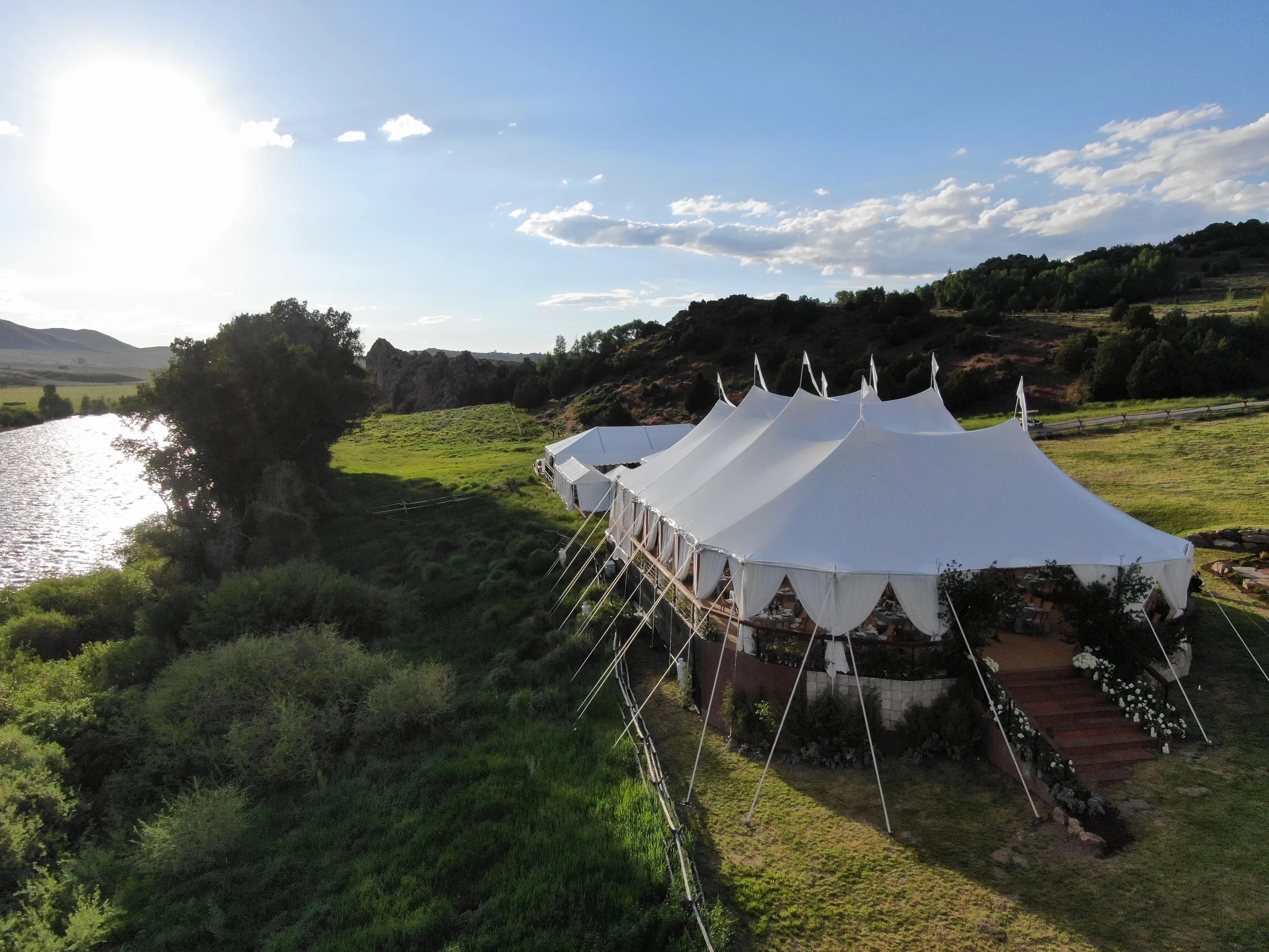 Outdoor summer wedding tent with reliable generator and cooling equipment