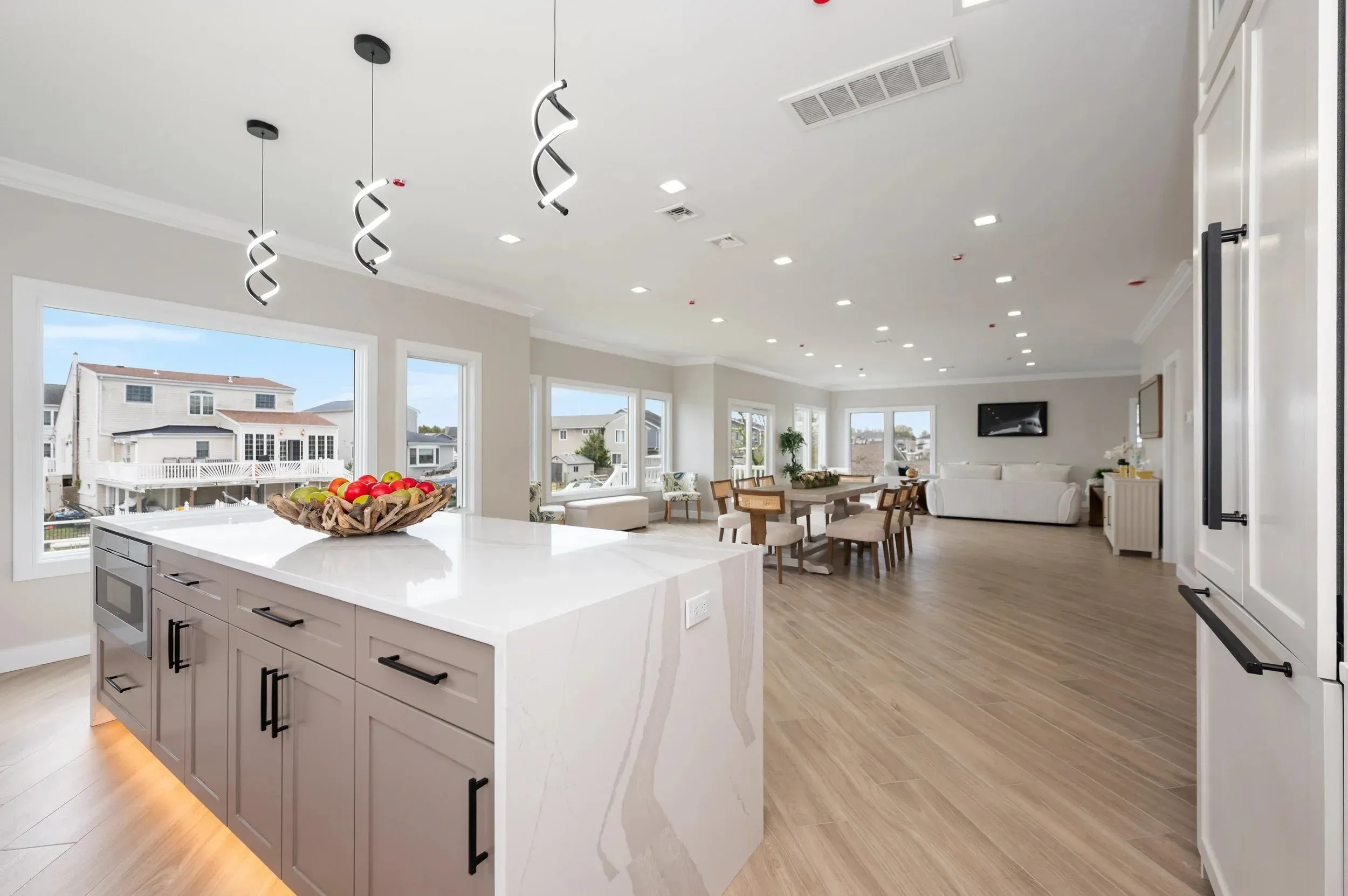 Variety of kitchen materials including countertops and cabinetry samples, highlighting design choices