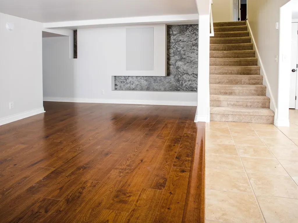 Popular room-to-room flooring pairings including hardwood, tile, and carpet
