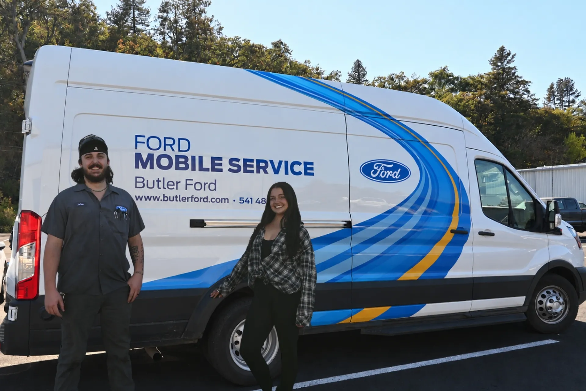 Ford Mobile Service Manager and Technician standing in front of Mobile Service van Ford Mobile Service Manager and Technician standing in front of Mobile Service van