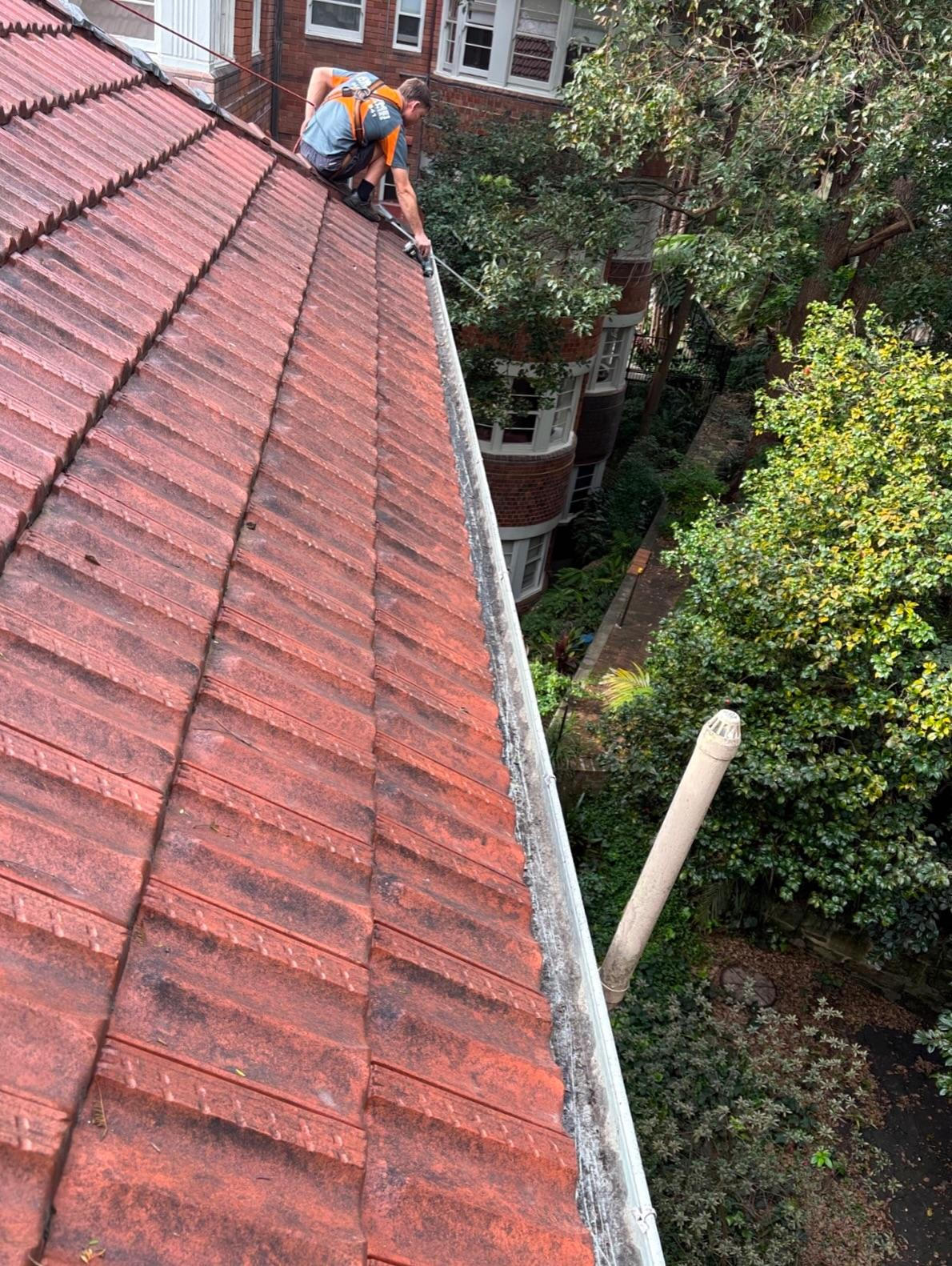 Building manager inspecting strata gutter cleaning in Sydney