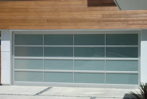 Tempered vs. Laminated Glass: Safety Standards and Structural Testing for Architectural Garage Door Systems