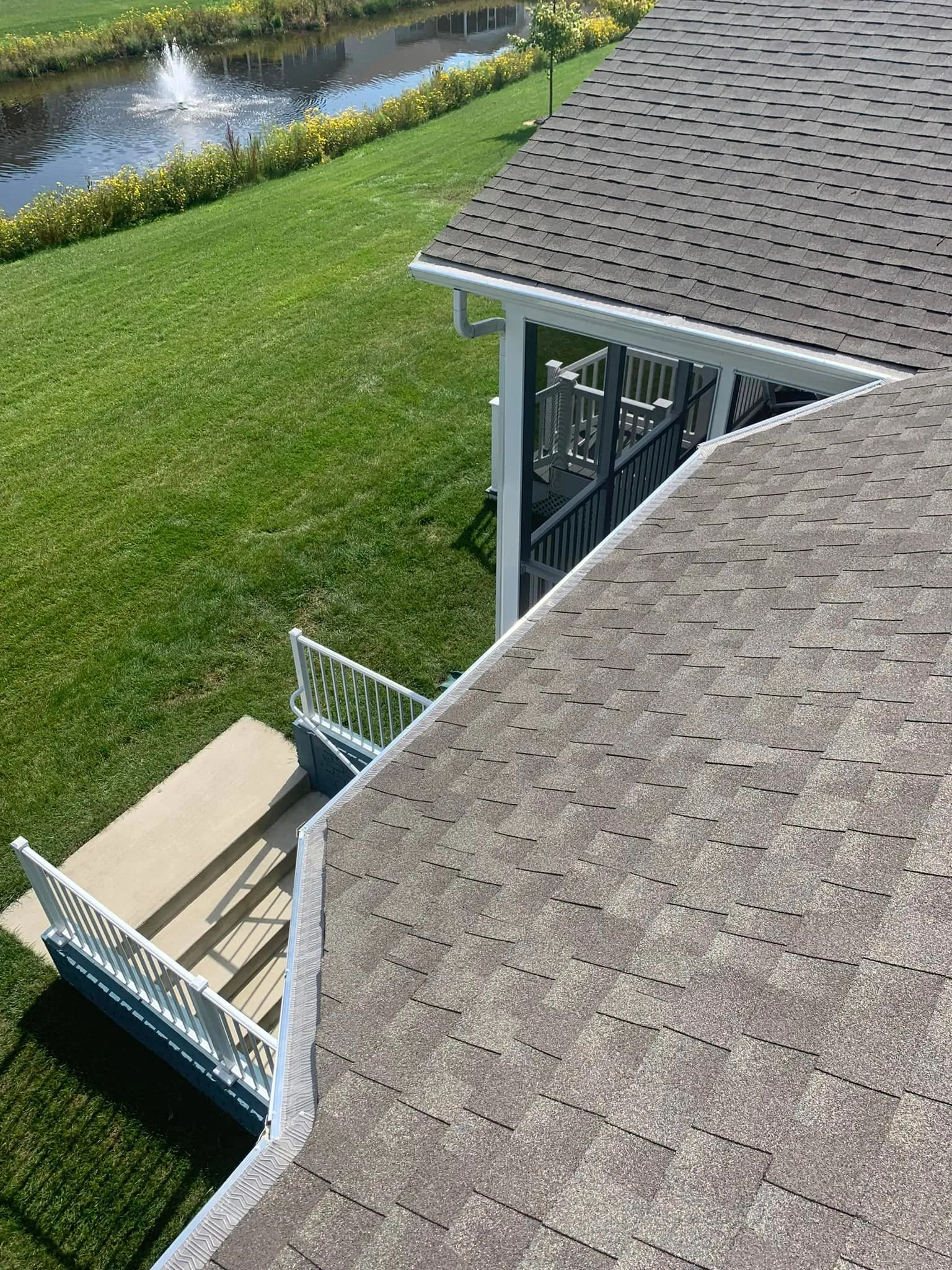 Newly installed seamless gutter system on an Ocean City coastal home