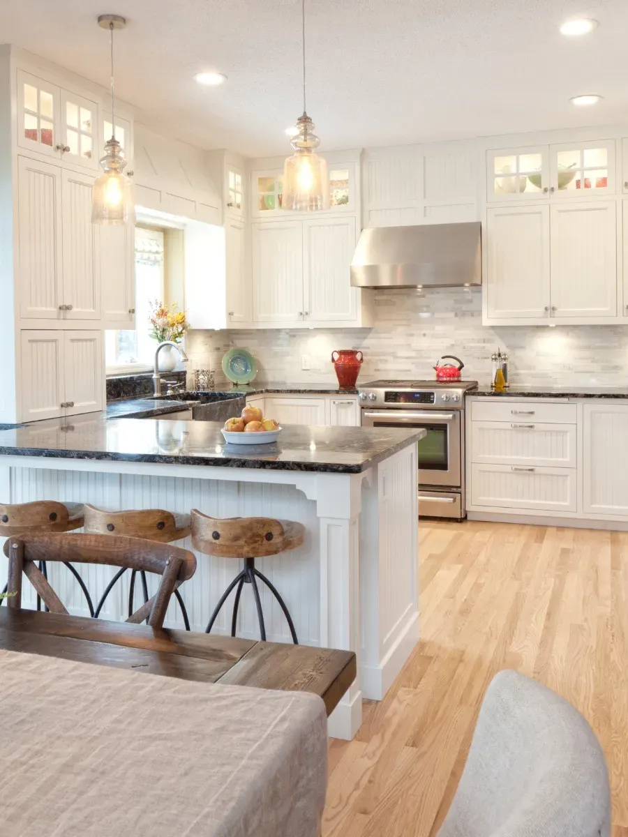 Modern kitchen with vinyl plank flooring that resembles natural wood, highlighting its design and water resistance