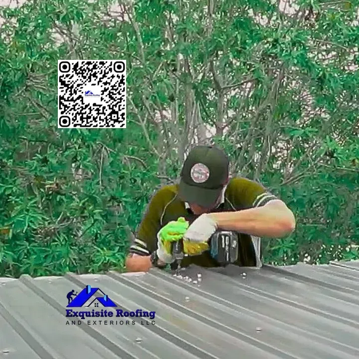Worker repairing a metal roof with tools, surrounded by greenery
