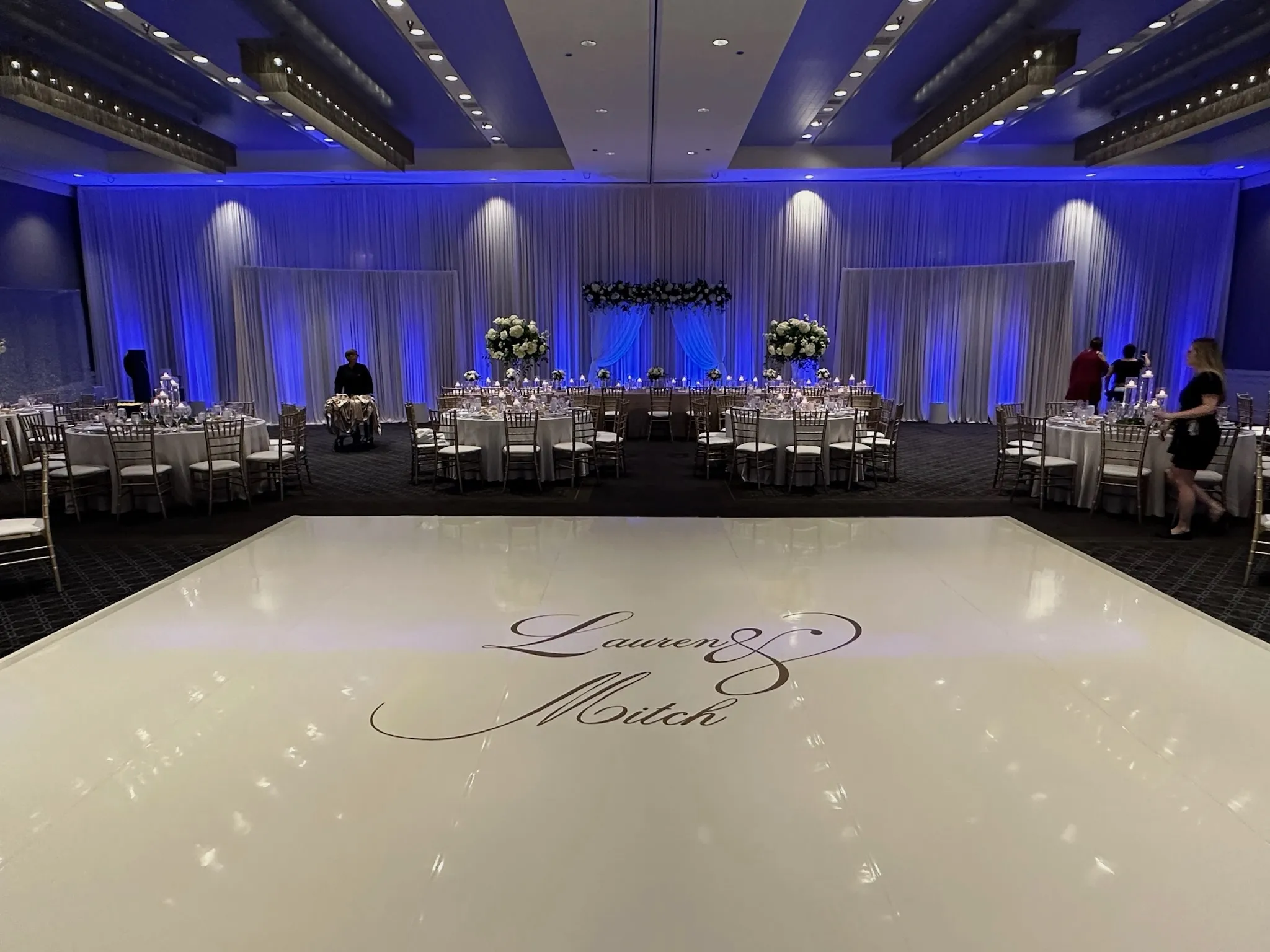 Luxury event stage with architectural uplighting