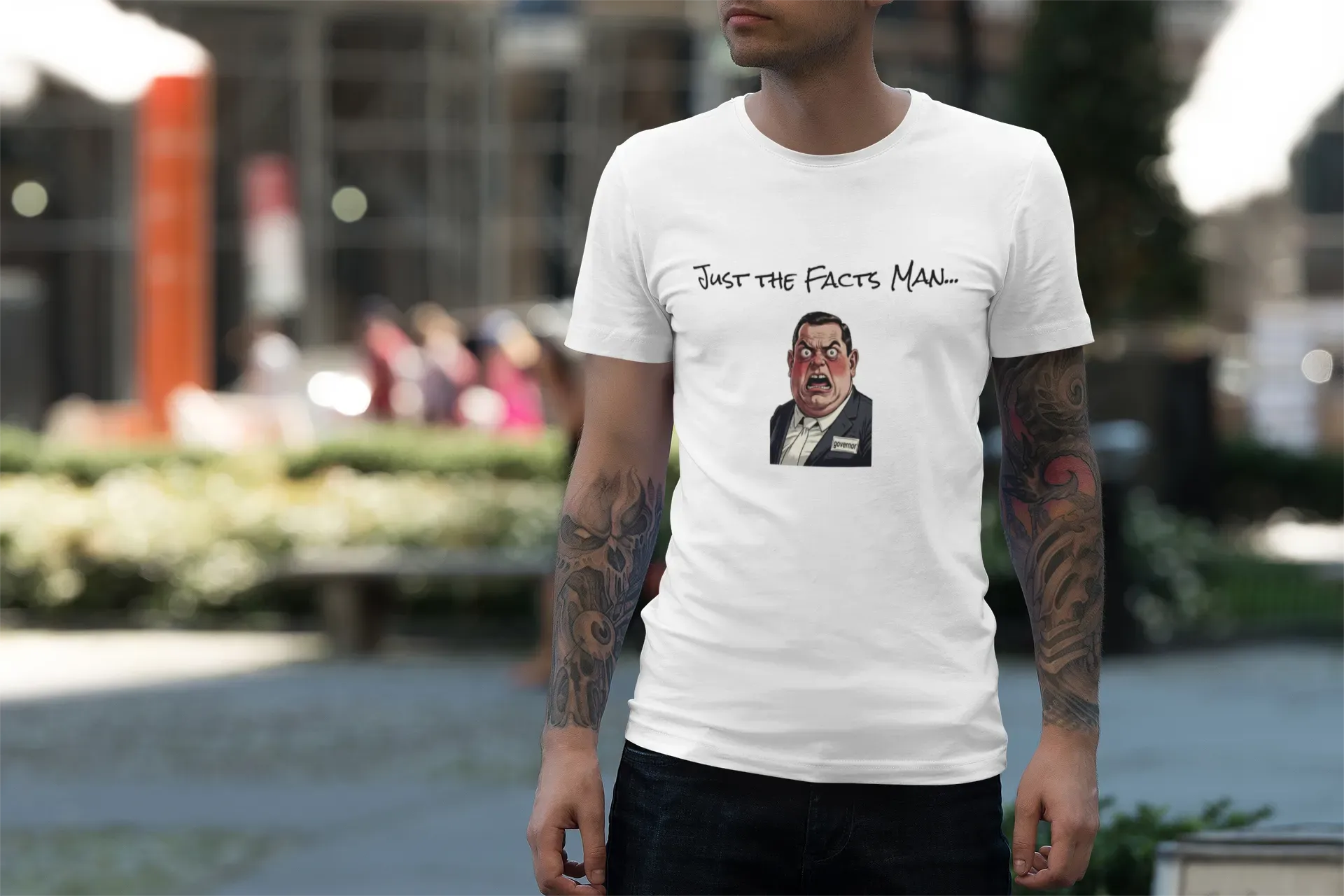 Flat lay of a motivational t-shirt styled with accessories, showcasing a complete outfit for casual outings