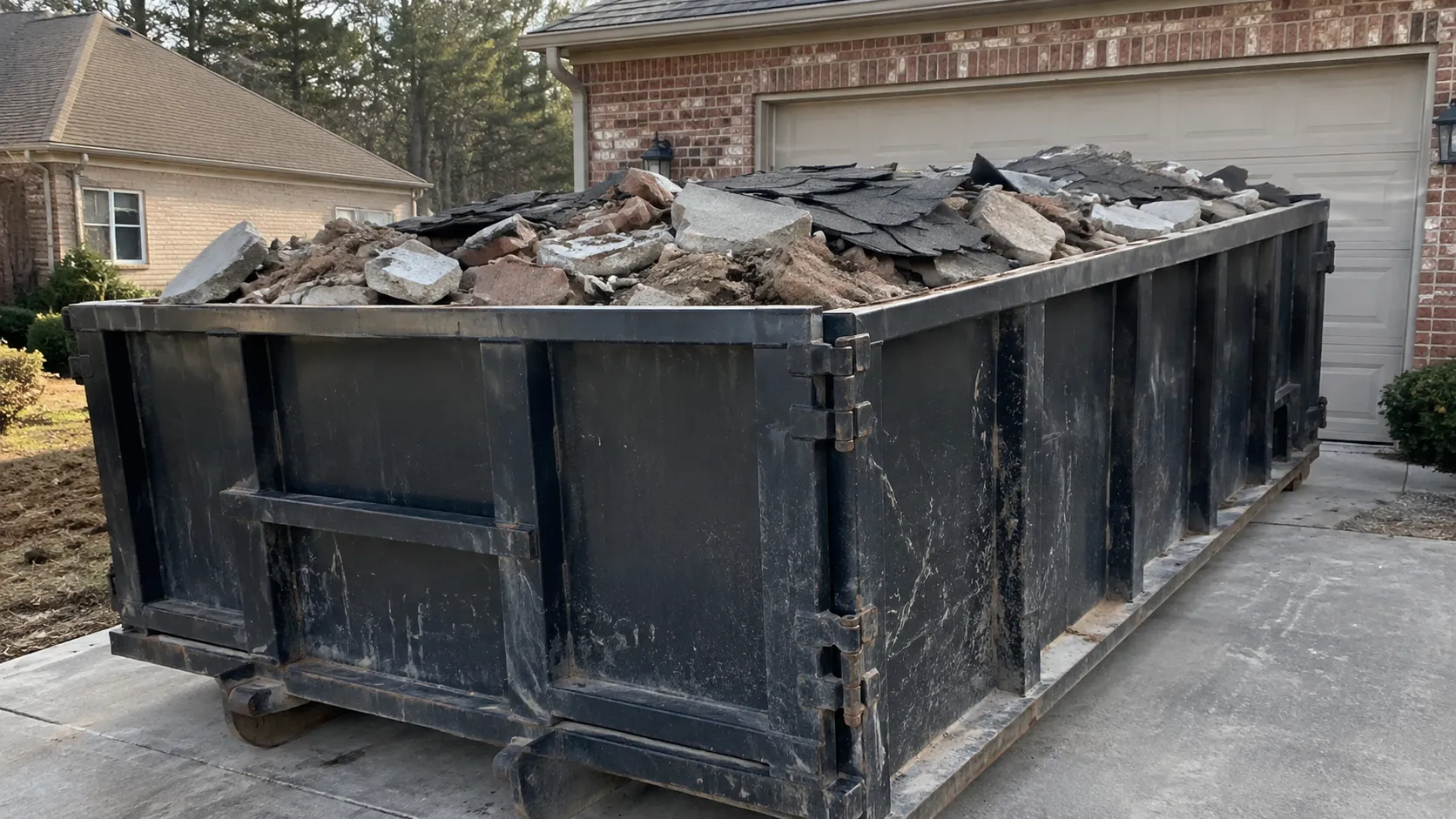 Heavy debris like roofing shingles and concrete affects dumpster rental weight limits in Salisbury MD