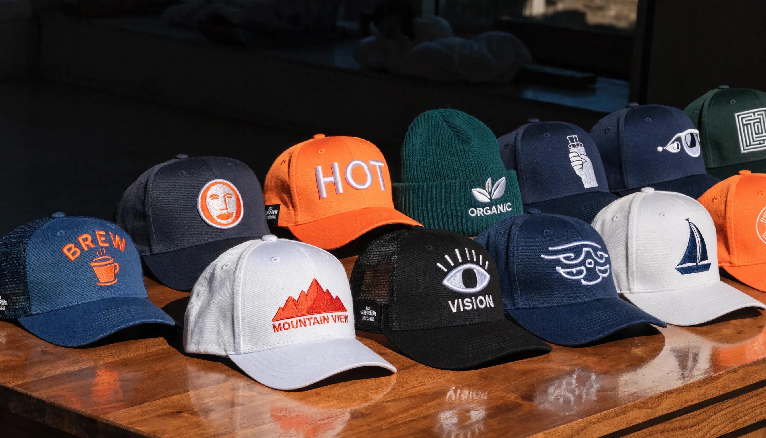 Colorful display of custom embroidered caps, highlighting personalization and branding options