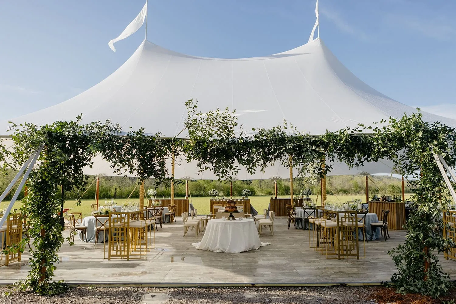 Luxury Century tent with timeless architecture for a summer wedding celebration