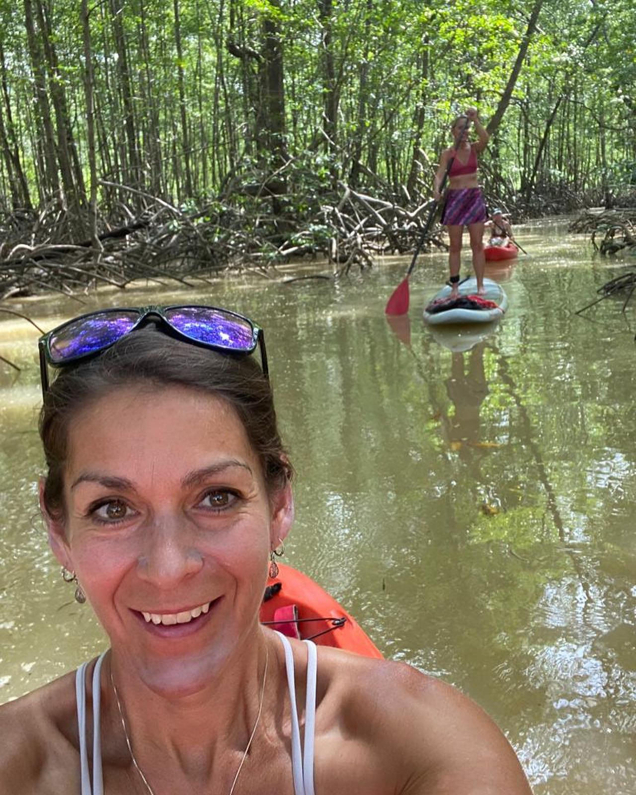 Paddleboarding in calm coastal waters