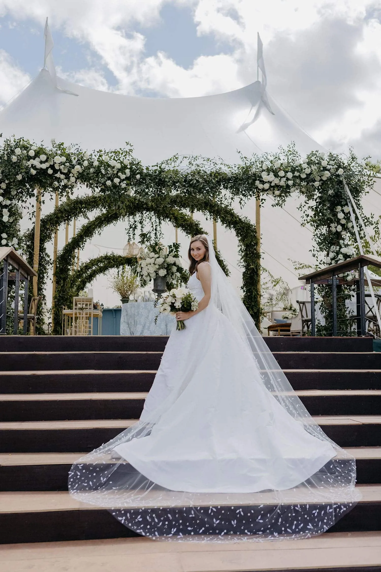 Cozy outdoor wedding lounge with comfortable seating and autumn d&eacute;cor in Charleston