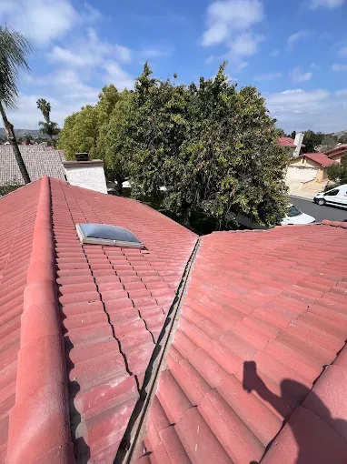 Red-tiled Inland Empire home with skylight installed on the roof