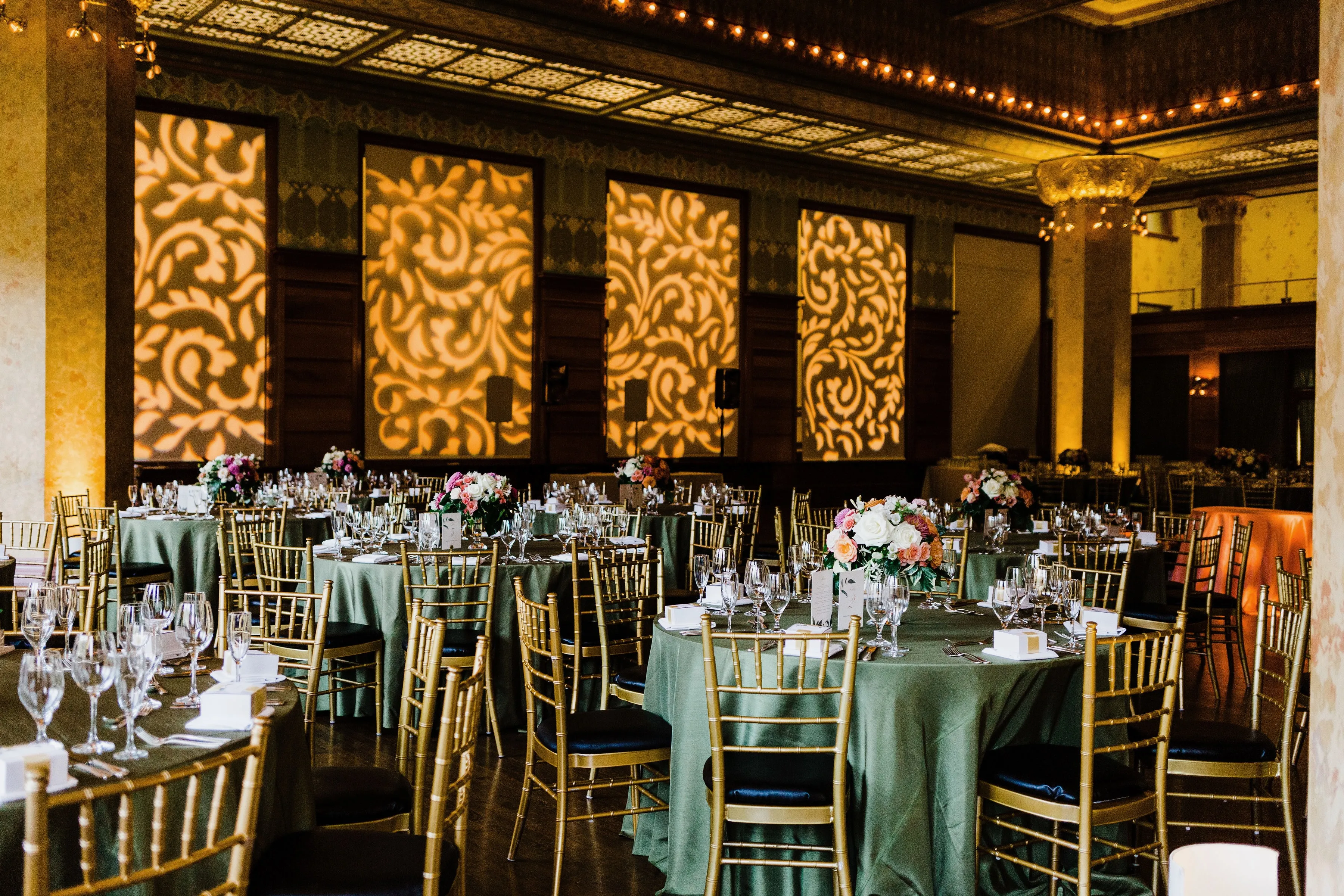 Elegant wedding reception with custom lighting
