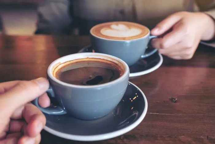 Realtor reviewing listings with a cup of coffee