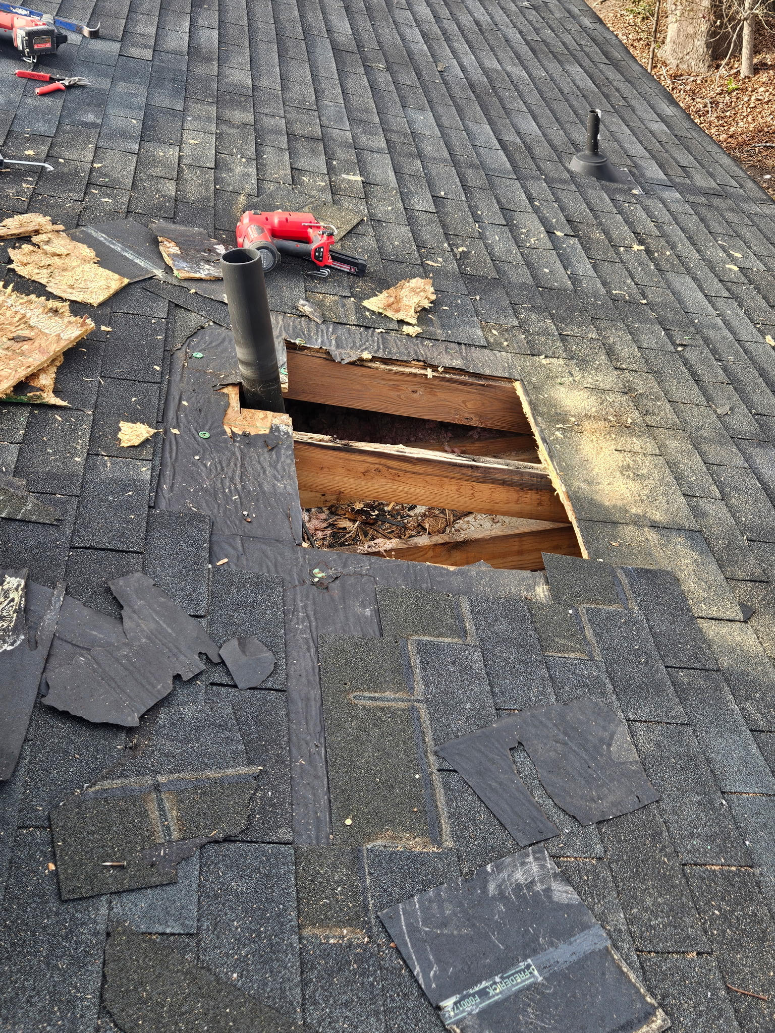 Close-up of ceiling water stains that indicate a roof leak