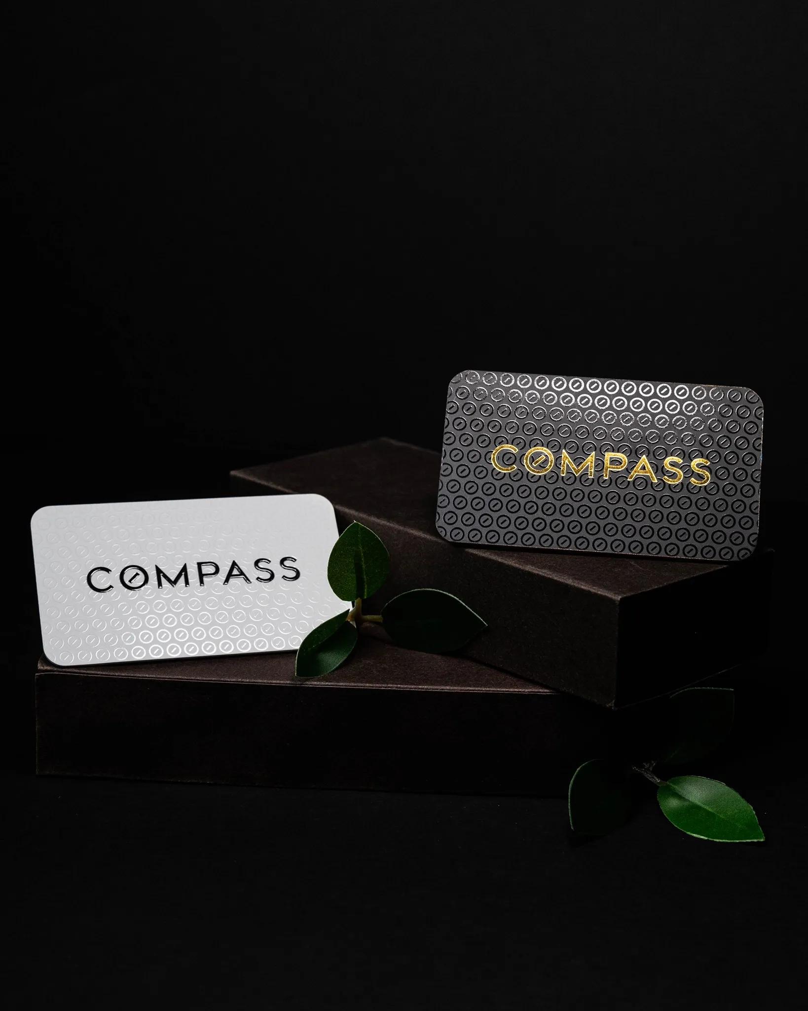 Close-up of various business card styles showcasing premium finishes and quality