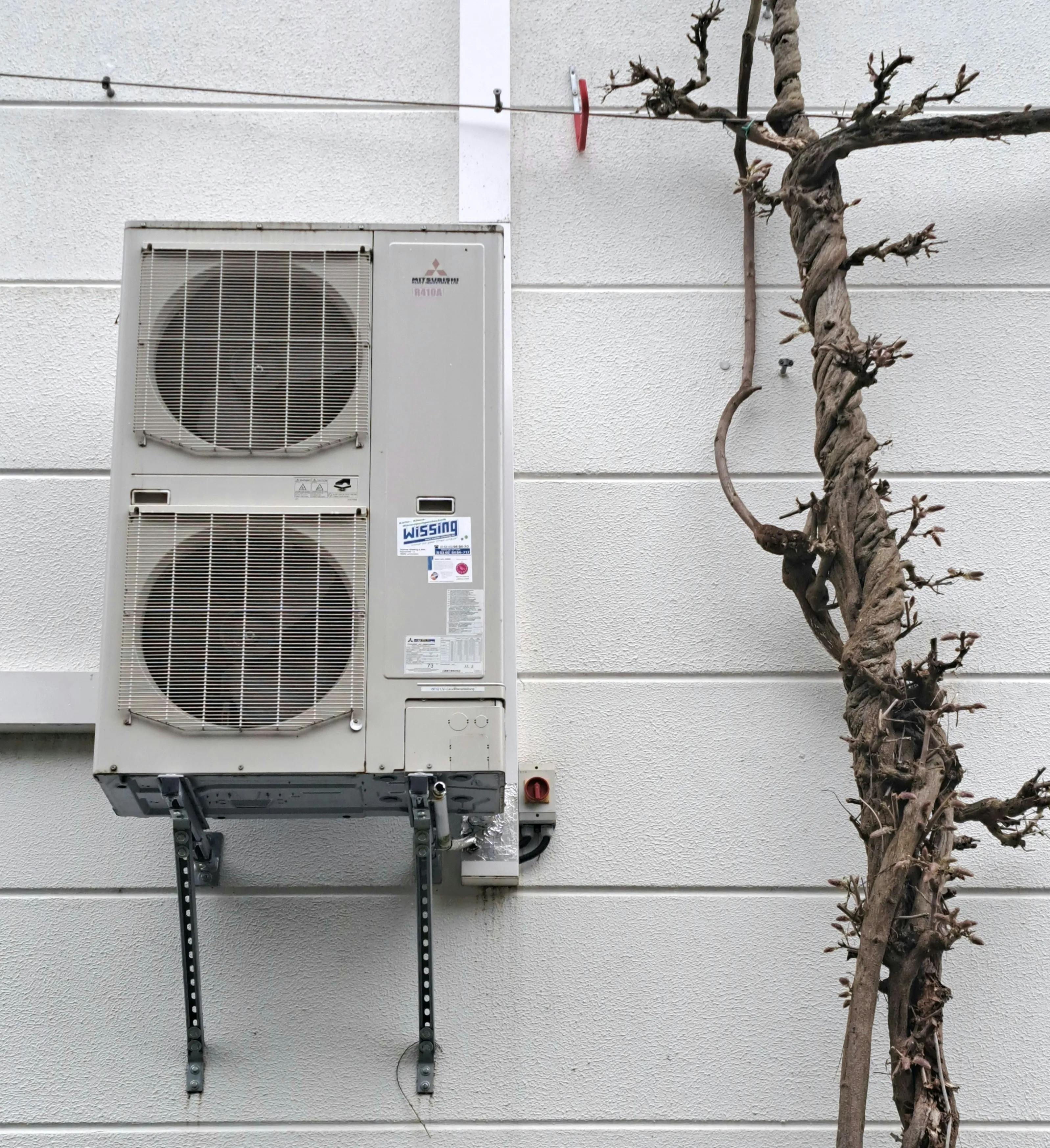 Outdoor HVAC unit showing signs that may indicate the need for emergency repair service