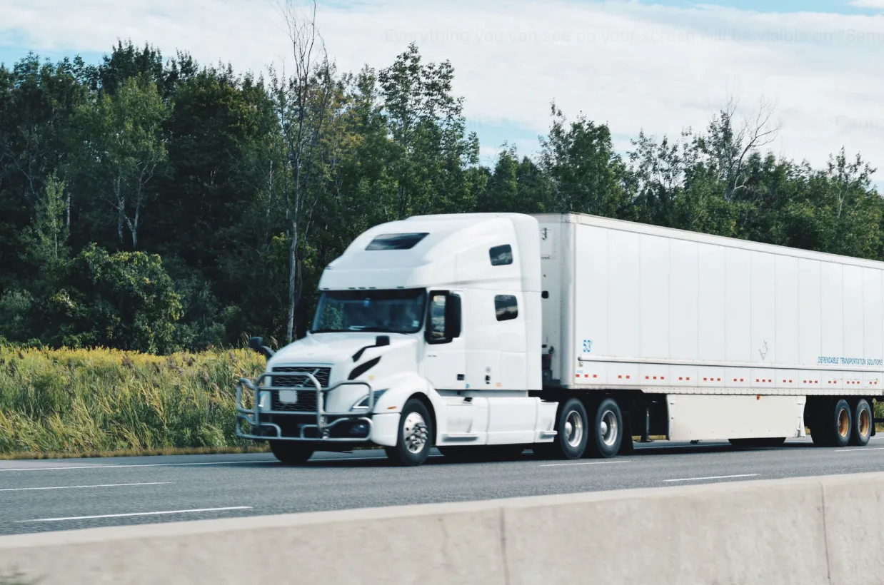 freight broker driving down the road