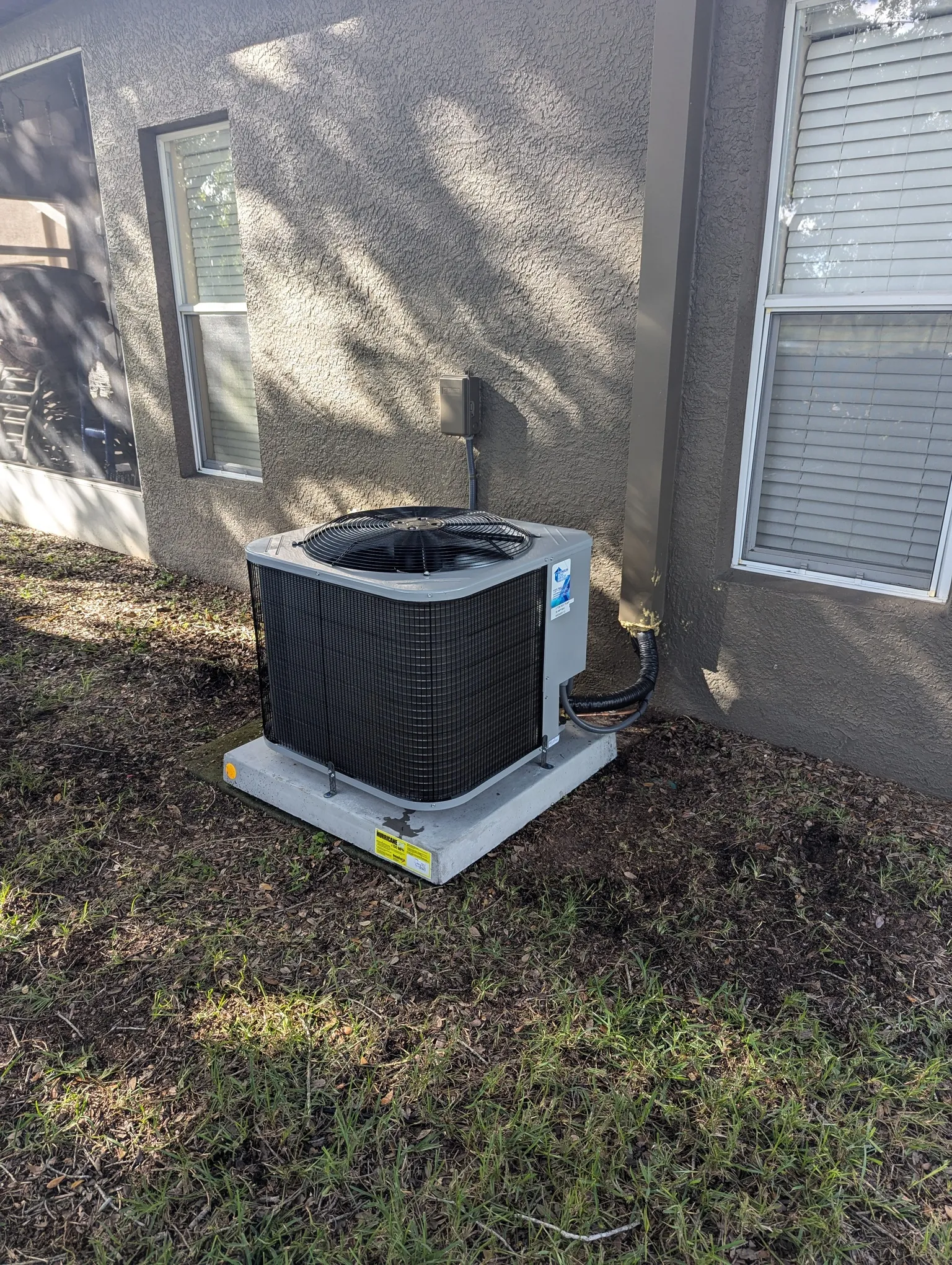 Outdoor AC unit showing a potential system issue requiring emergency repair service and fast attention Outdoor AC unit showing a potential system issue requiring emergency repair service and fast attention