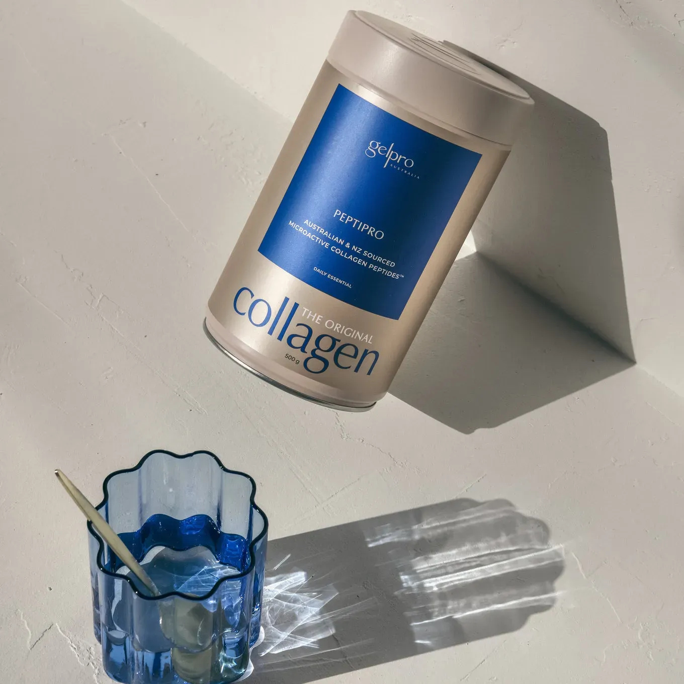 Close-up of shiny hair strands with collagen peptide powder in a serene bathroom