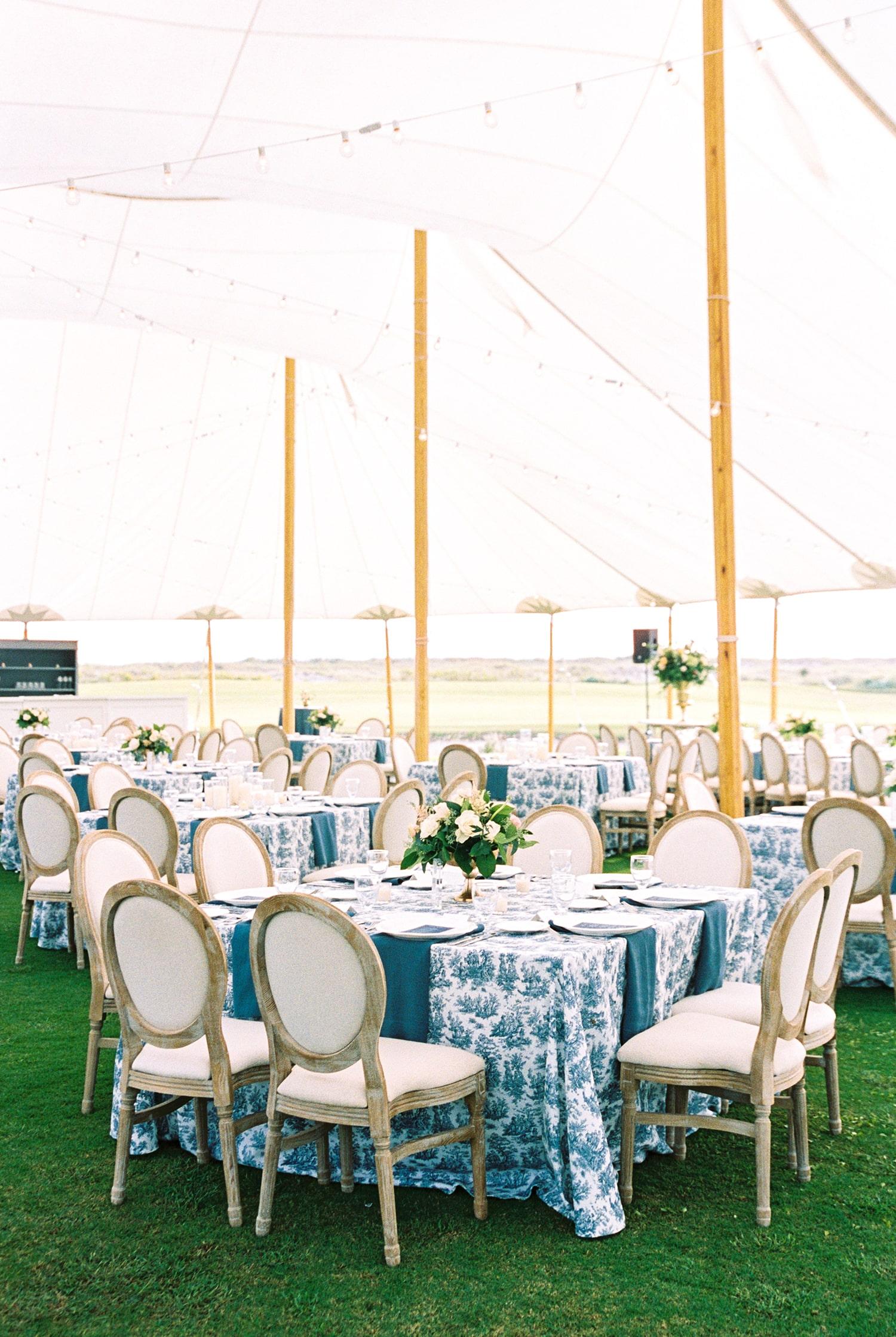 Rectangular table setup for buffet service at a summer party, featuring food arrangements and accessible pathways