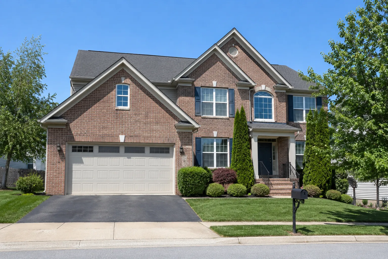 Single-family home in a Stafford neighborhood with mature trees