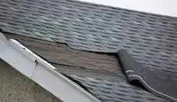 Different roofing materials including asphalt shingles, metal sheets, and synthetic tiles