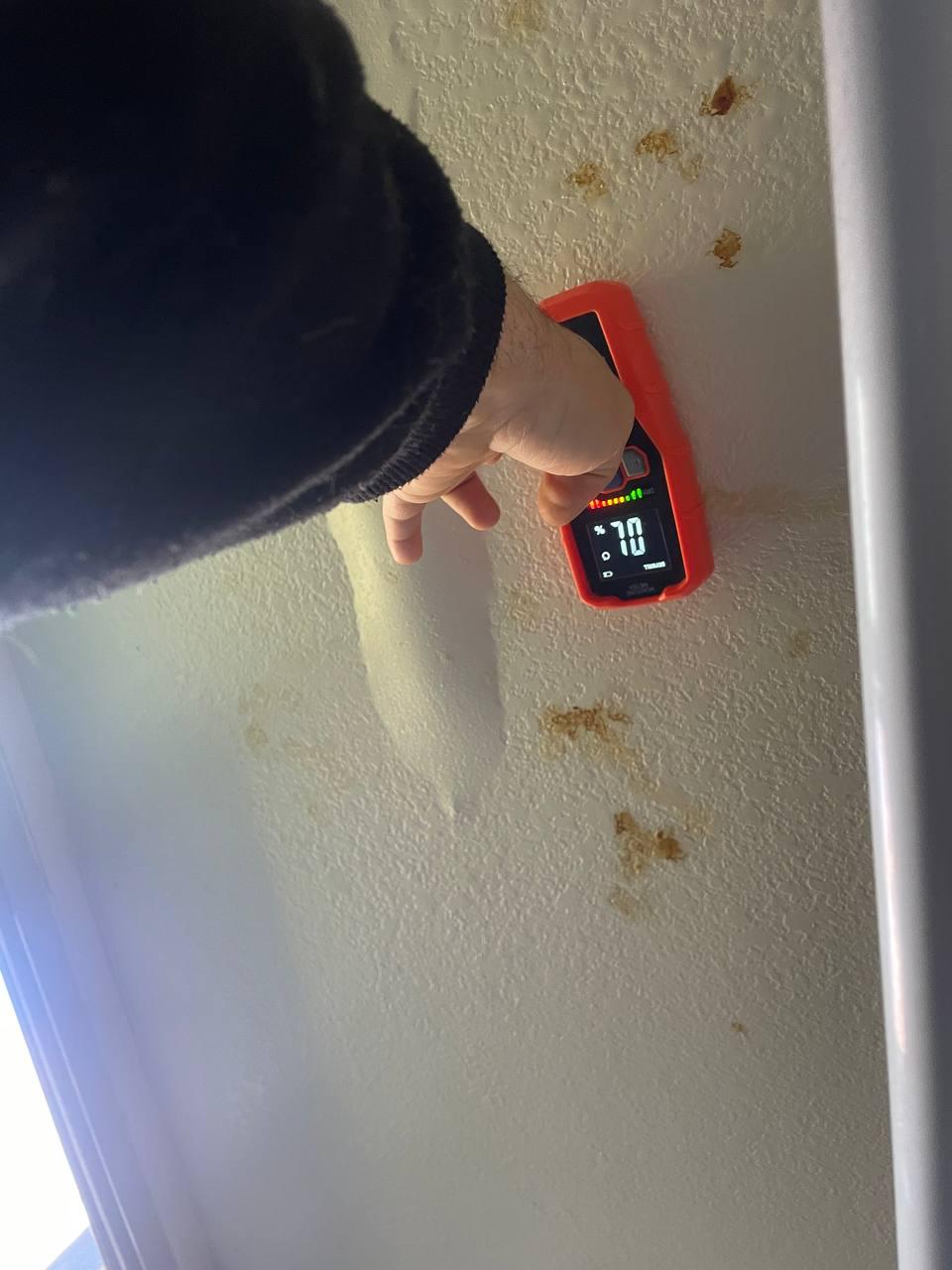 HVAC contractor inspecting a residential system for quality assurance