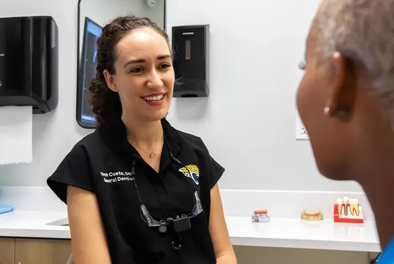 Patient recovering at home after dental implant surgery