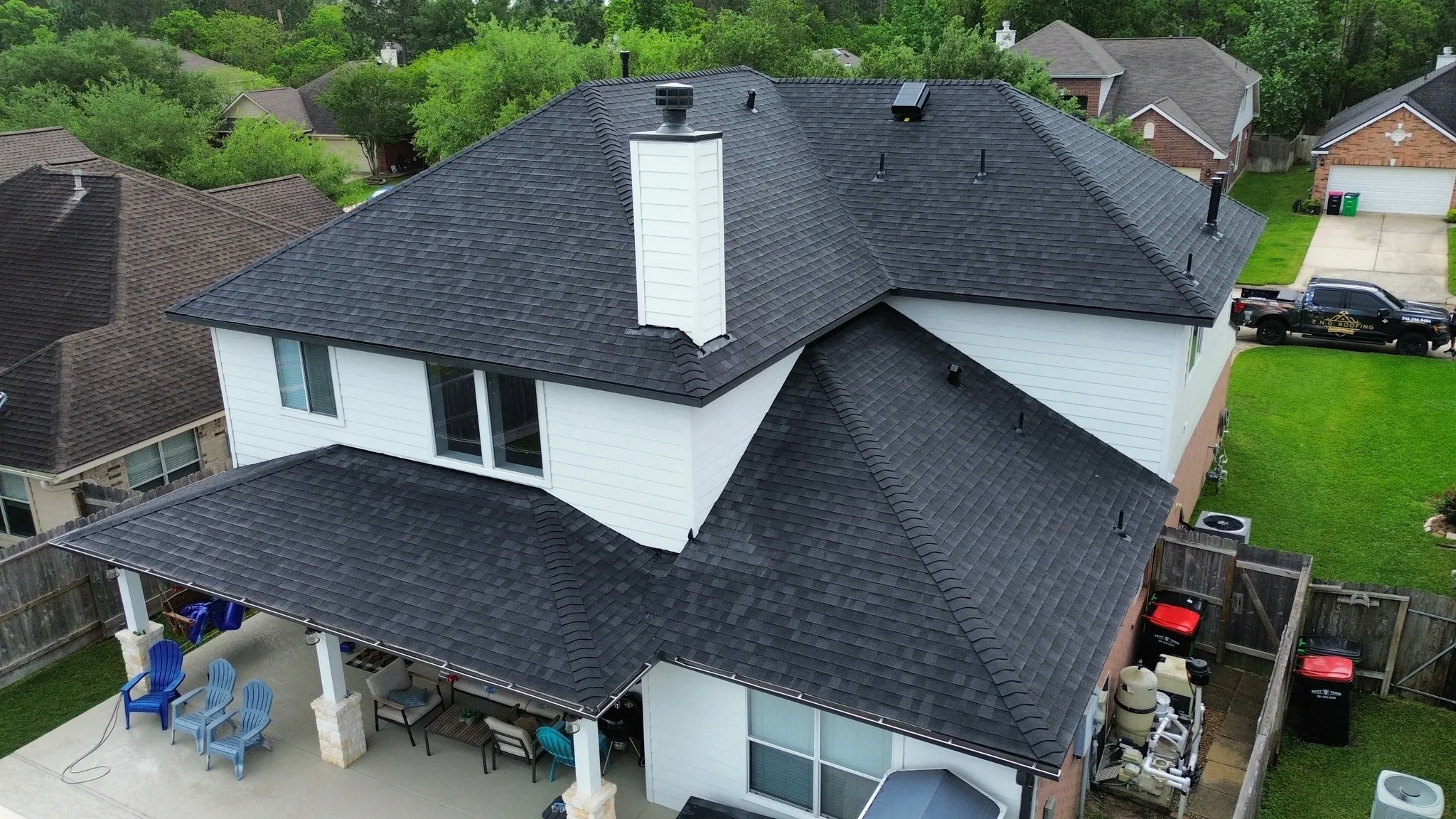 Professional roofers working on a residential roofing project, emphasizing quality and reliability Professional roofers working on a residential roofing project, emphasizing quality and reliability