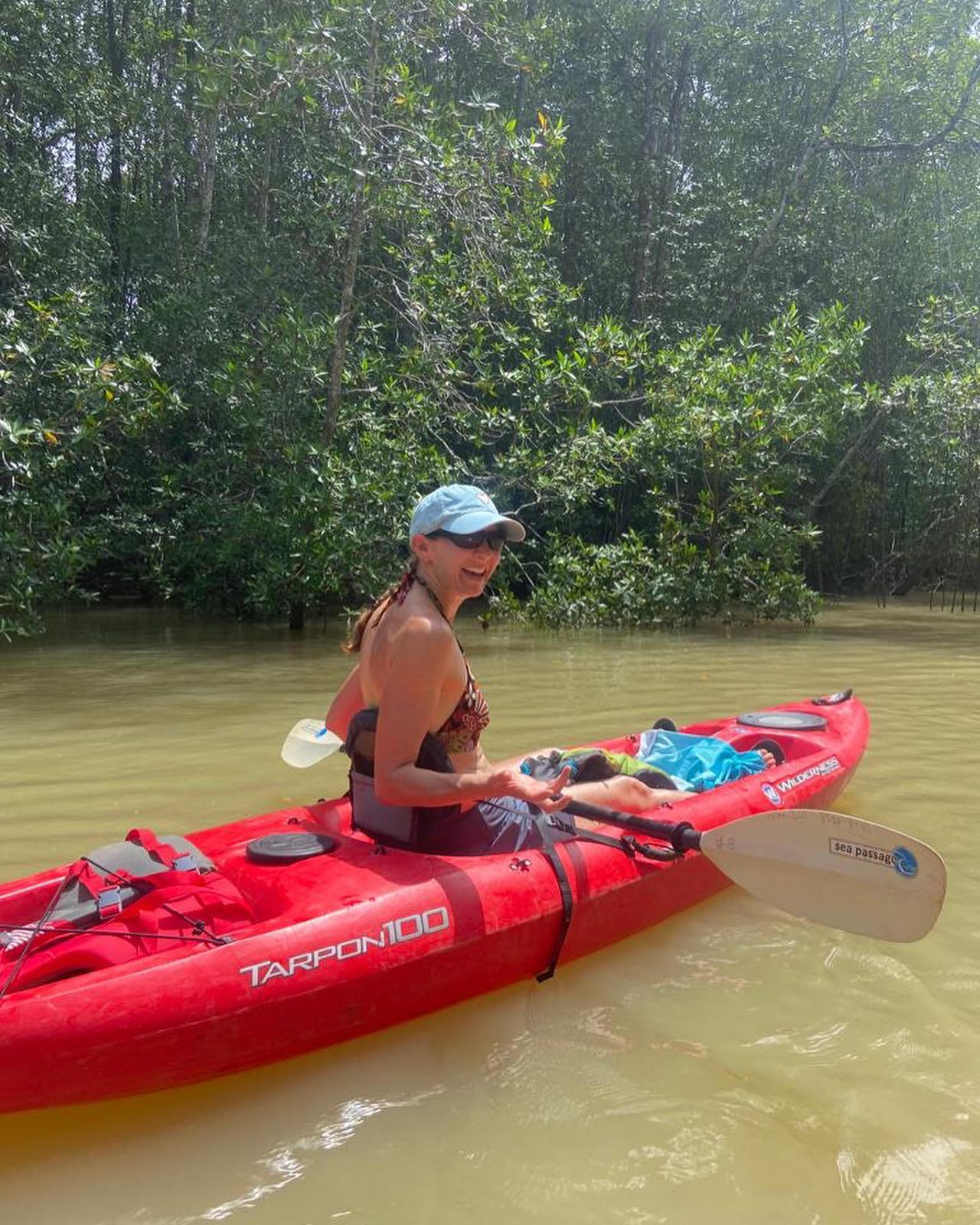 Kayaking along lush Costa Rican waterways