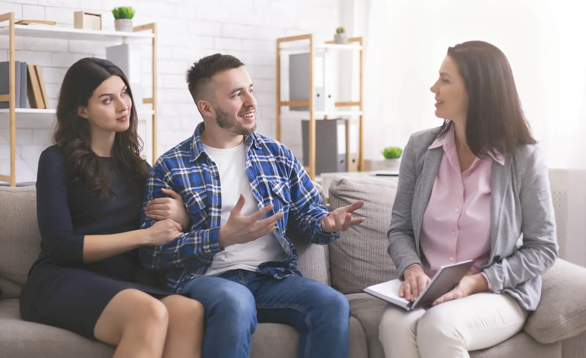 Couple discussing mortgage options in a cozy home setting