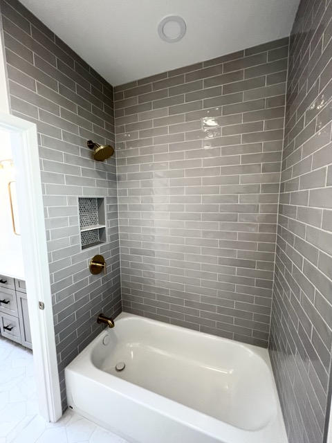 Modern remodeled bathroom in Tucson with elegant fixtures and stylish design