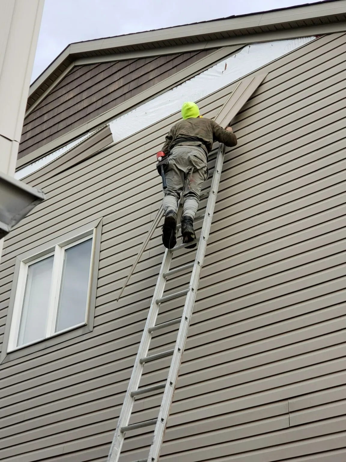 New vinyl siding panels not matching older sun-faded siding