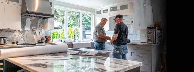 Interior designer showing kitchen cabinet designs to homeowner with samples and sketches