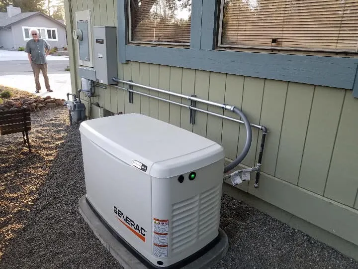 Whole house generator providing power during a power outage with lights on inside the home